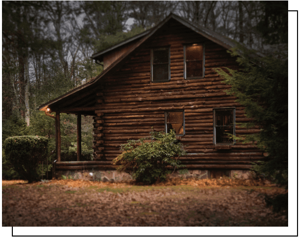 An abandoned log cabin in the wilderness